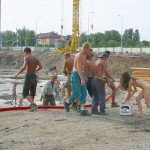 Handing out beer at a construction